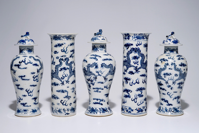 A five-piece Chinese blue and white garniture with dragons, 19th C.