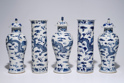 A five-piece Chinese blue and white garniture with dragons, 19th C.