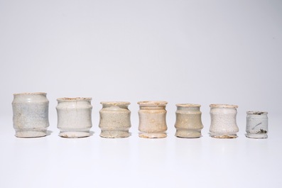 A set of seven white Dutch Delft albarello-shaped ointment jars, 17th C.