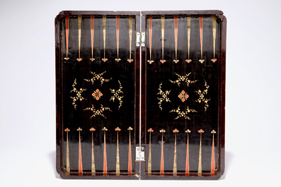 A fine Chinese lacquer chess and backgammon board with ivory game pieces, 19th C.