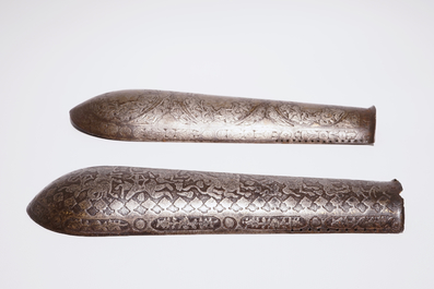 Two engraved and damascened Qajar bazuband arm guards, Iran, 18/19th C.