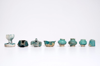 A collection of Islamic turquoise glazed oil lamps, jars and vessels, a.o. Raqqa, 13th C. and later