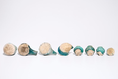 A collection of Islamic turquoise glazed oil lamps, jars and vessels, a.o. Raqqa, 13th C. and later