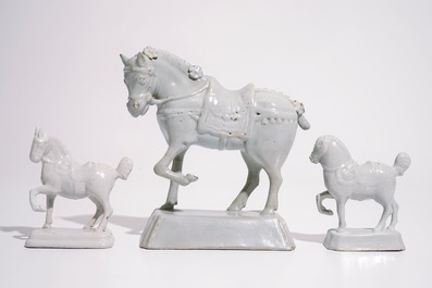 Three various white Dutch Delft horses, 18th C.