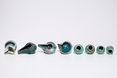 A collection of Islamic turquoise glazed oil lamps, jars and vessels, a.o. Raqqa, 13th C. and later
