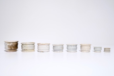 A set of eight white Dutch Delft ointment jars, 17th C.