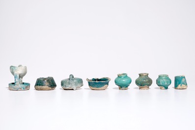 A collection of Islamic turquoise glazed oil lamps, jars and vessels, a.o. Raqqa, 13th C. and later