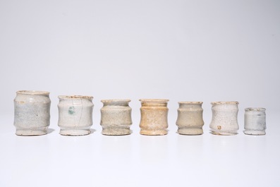 A set of seven white Dutch Delft albarello-shaped ointment jars, 17th C.