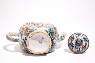 A Dutch Delft cashmire palette teapot with birds and insectes among flowers, early 18th C.