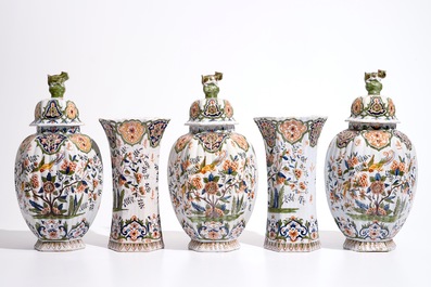 Une garniture de cinq vases en fa&iuml;ence de style Delft polychrome, France, 19&egrave;me