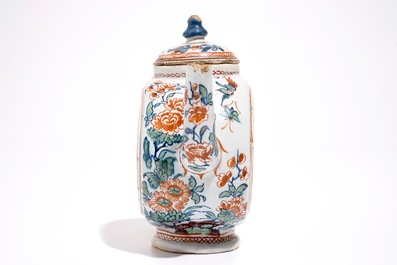 A Dutch Delft cashmire palette teapot with birds and insectes among flowers, early 18th C.