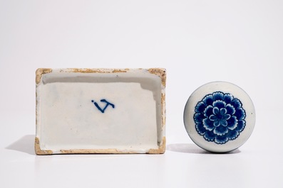 A large Dutch Delft blue and white tea caddy with original cover, ca. 1700