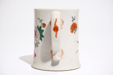 A Chinese famille rose mug with flowers and rockwork, Qianlong