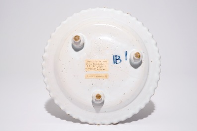 A German blue and white lobed plate on three feet, N&uuml;rnberg, 17th C.