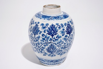 A Dutch Delft blue and white jar with peony scrolls in Ming-style, late 17th C.