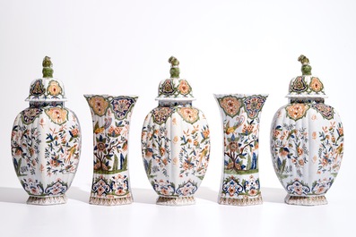 Une garniture de cinq vases en fa&iuml;ence de style Delft polychrome, France, 19&egrave;me