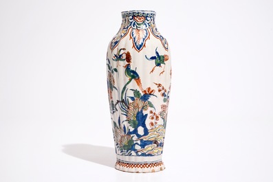 A gadrooned Dutch Delft cashmire palette vase with birds among flowers, ca. 1700