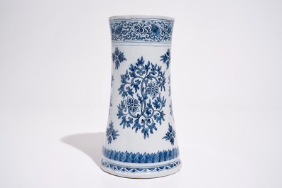 A Dutch Delft blue and white mug with lotus scrolls in Ming-style, late 17th C.