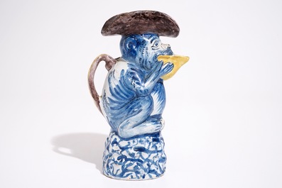 A polychrome Dutch Delft milk jug in the shape of a monkey, 19th C.