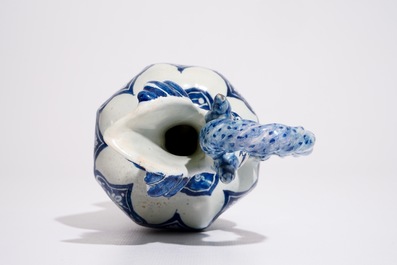 A Dutch Delft blue and white rope twist handle jug, late 17th C.