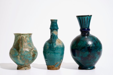 Three Islamic turquoise glazed jugs, incl. Raqqa and Iran, 14th C. and later