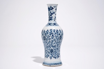 A Dutch Delft blue and white vase with peony scrolls in Ming-style, late 17th C.