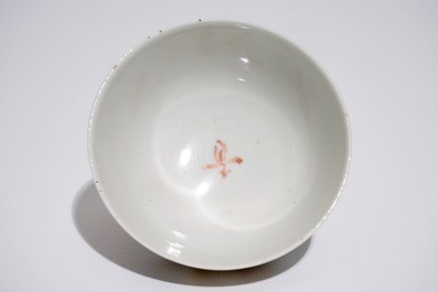 A Chinese famille rose mandarin cup and saucer, Qianlong