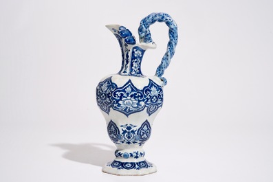 A Dutch Delft blue and white rope twist handle jug, late 17th C.