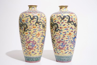 A pair of tall Chinese yellow ground meiping dragon vases, Qianlong mark, 20th C.