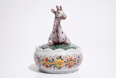 A polychrome Dutch Delft butter tub with a goat, 18th C.