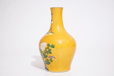 A Chinese yellow ground famille rose vase, 20th C.