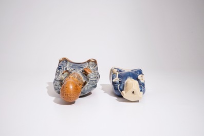 Two Chinese blue and white glazed biscuit figures of immortals, Qianlong