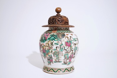 A Chinese famille rose warriors jar with wooden cover, 19th C.