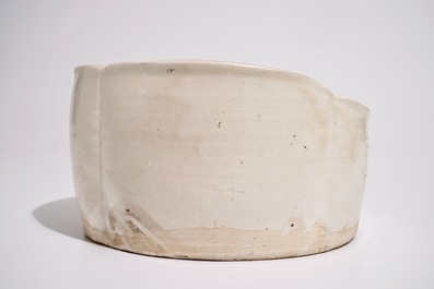 A Chinese Cizhou cream-glazed sgraffiato pillow, Song, 12th C.