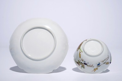 A fine Chinese export porcelain eggshell cup and saucer with a couple with a birdcage, Yongzheng