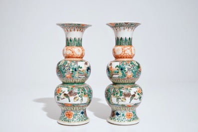A pair of Chinese famille verte triple gourd vases, 19th C.
