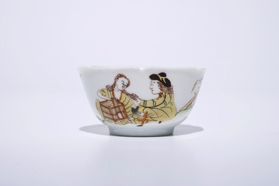 A fine Chinese export porcelain eggshell cup and saucer with a couple with a birdcage, Yongzheng