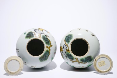 A pair of Chinese famille rose covered jars with cranes and deers, 19/20th C.