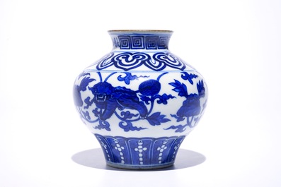 A Chinese blue and white baluster vase with buddhist lions, 19th C.