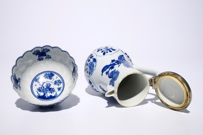 A Chinese blue and white silver-mounted jug and cover, a cup and saucer and three saucer plates, Kangxi