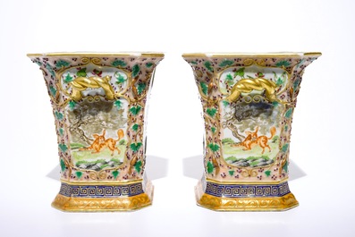 A pair of Chinese famille rose export bough pots with twisted handles and relief-decorated squirrels, Qianlong