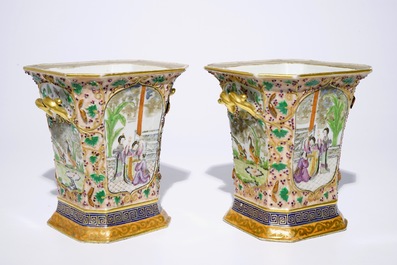 A pair of Chinese famille rose export bough pots with twisted handles and relief-decorated squirrels, Qianlong