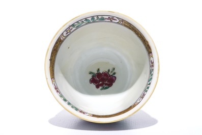 A Chinese double-walled famille rose cup and saucer, Yongzheng/Qianlong