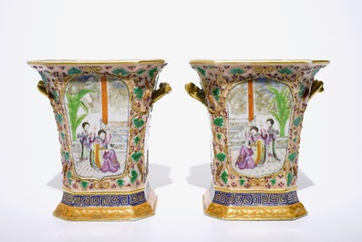 A pair of Chinese famille rose export bough pots with twisted handles and relief-decorated squirrels, Qianlong