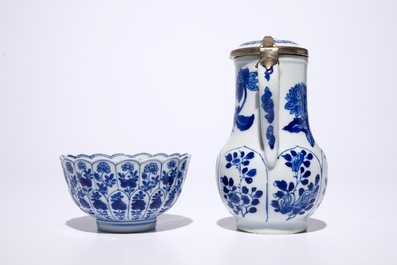 A Chinese blue and white silver-mounted jug and cover, a cup and saucer and three saucer plates, Kangxi