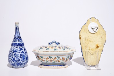 A Dutch Delft blue and white holy water font and a vase, with a polychrome covered spice box, 18th C.
