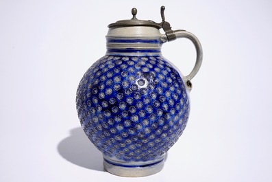 A large globular Westerwald jug with pewter lid, 17th C.