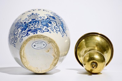 A Dutch Delft blue and white tobacco jar with brass cover, 18th C.