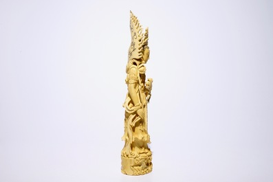 A tall Chinese carved and inlaid ivory figure of Guanyin, 19th C.