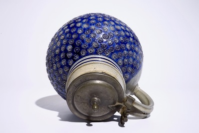 A large globular Westerwald jug with pewter lid, 17th C.